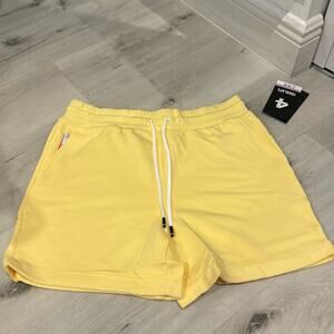 Fourlaps NWT Rush Short Banana in Yellow with Pockets and Drawstring.
